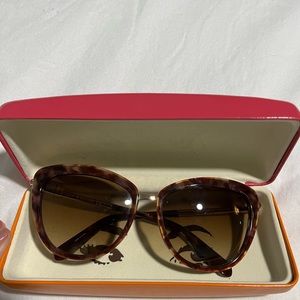 Kate Spade sunglasses.